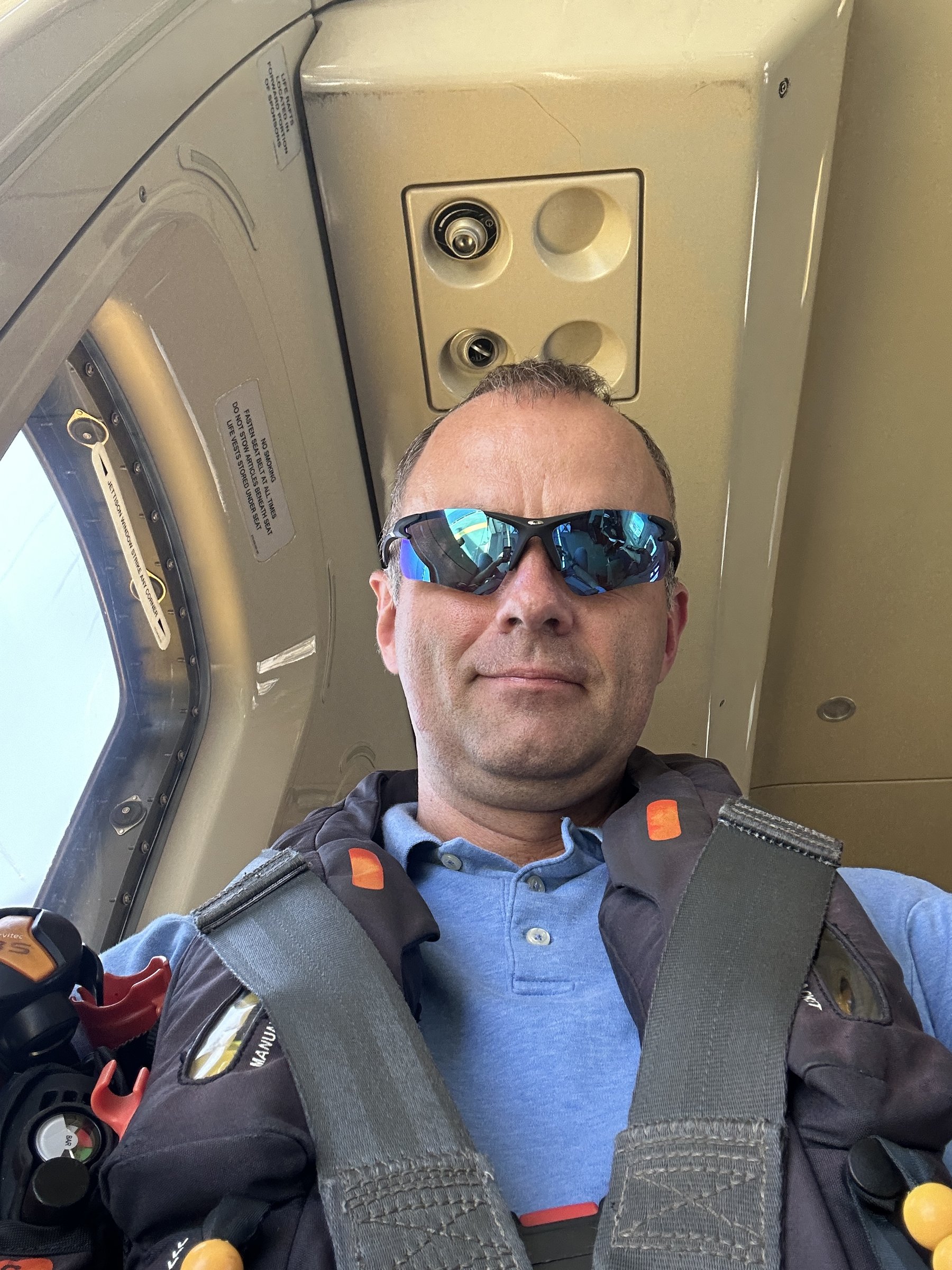 Daniel Czarkowski in helicopter transit safety gear