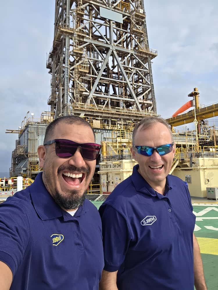 Daniel Czarkowski with Alex on a drillship helideck