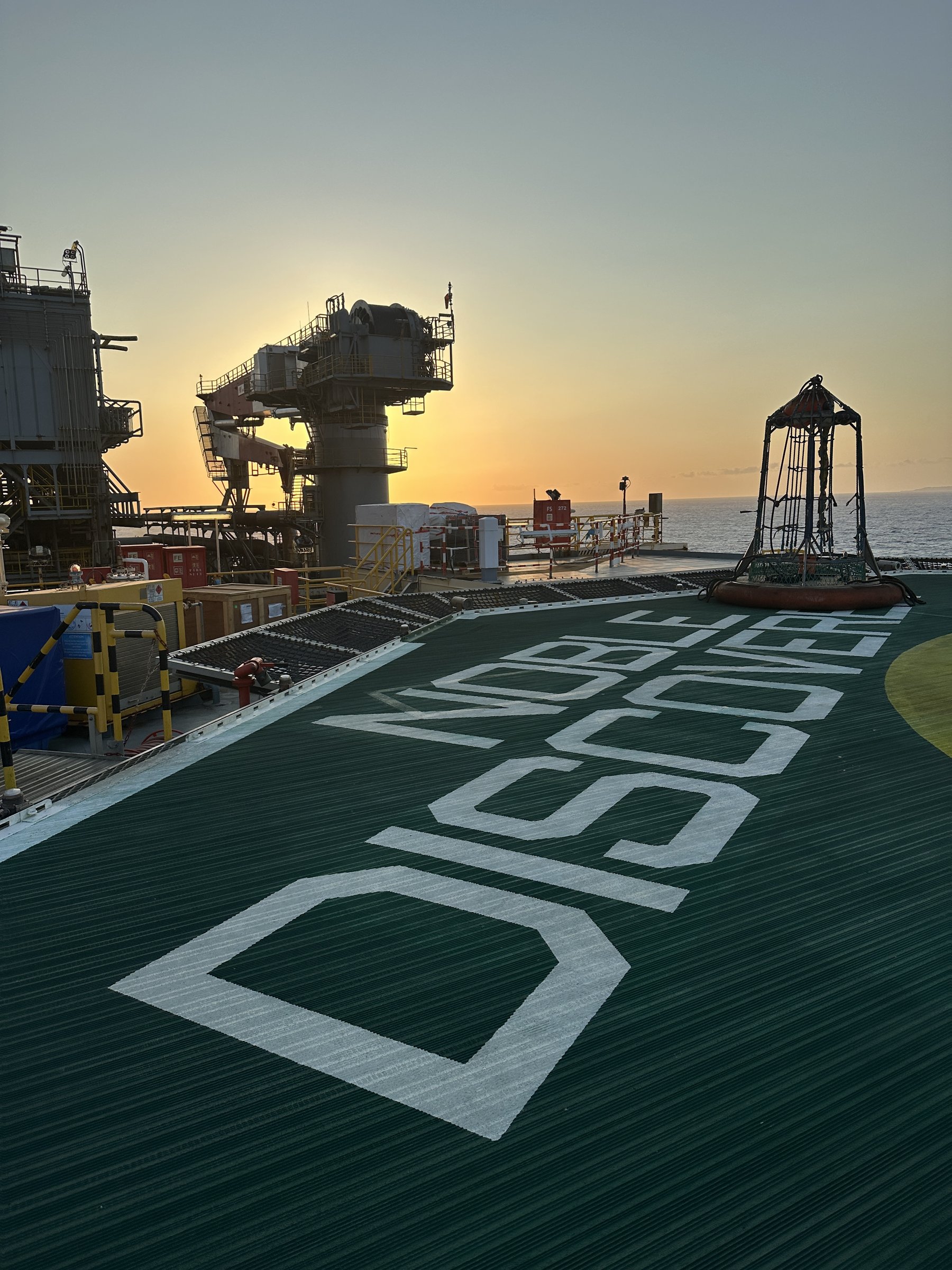 Noble Discoverer helideck at sunset