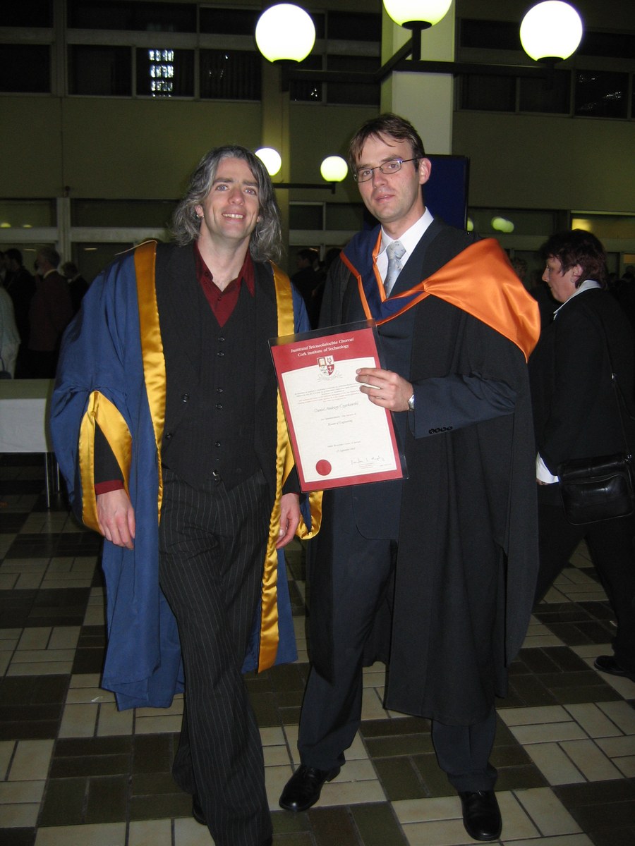 Daniel Czarkowski at his Cork Institute of Technology graduation, holding his Master of Engineering diploma